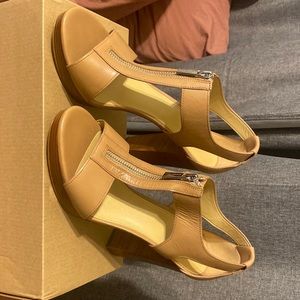 Like new Michael Kors size 7.5M beige sandals.